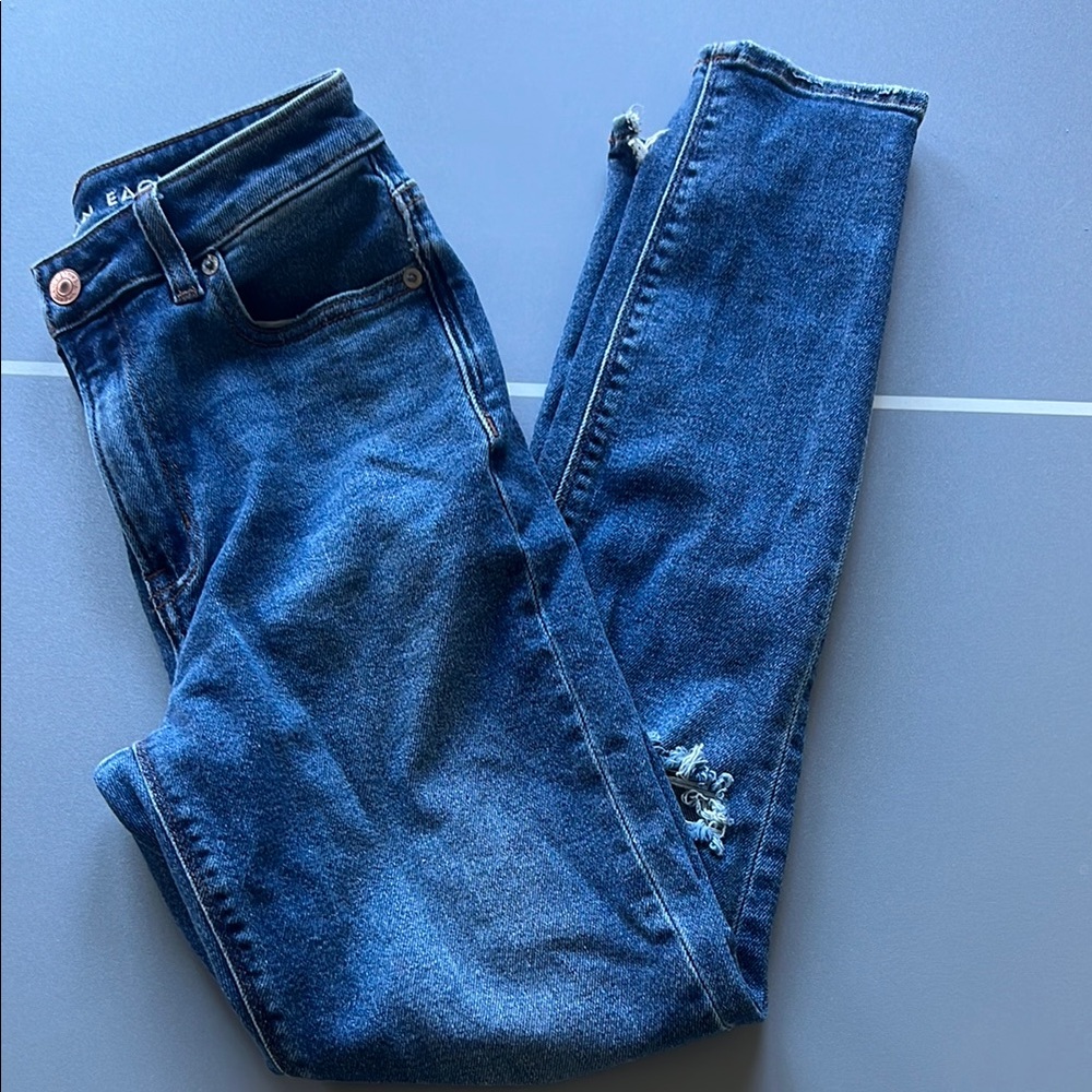 Blue Skinny Jeans with Distressed Details